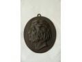 Medalion z podobizną Adama Mickiewicza