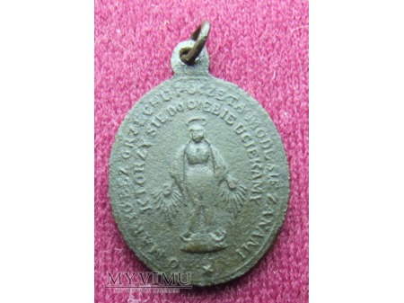 Stary medalik ze św. Izydorem Oraczem