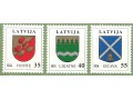 Łotewskie znaczki z herbami miast.